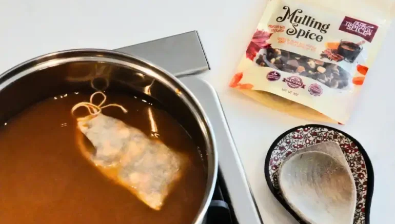 mulling spice pieces with muslin bag